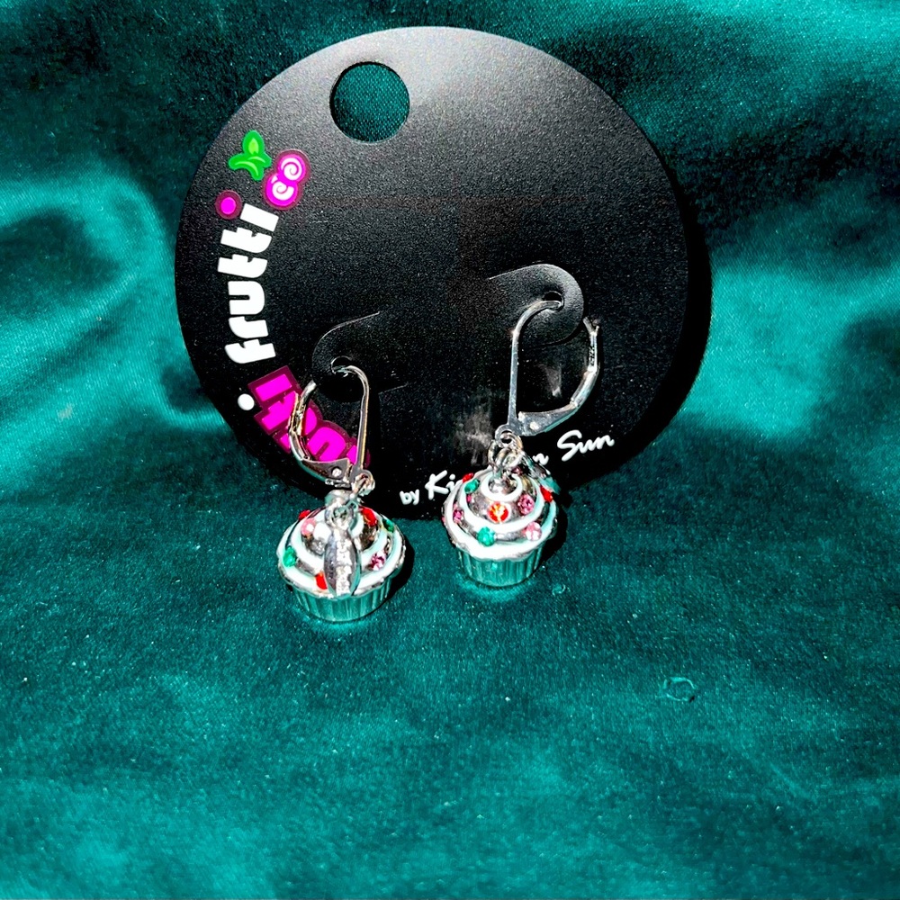 Hanging silver cupcake earrings. Brand new! Never worn.